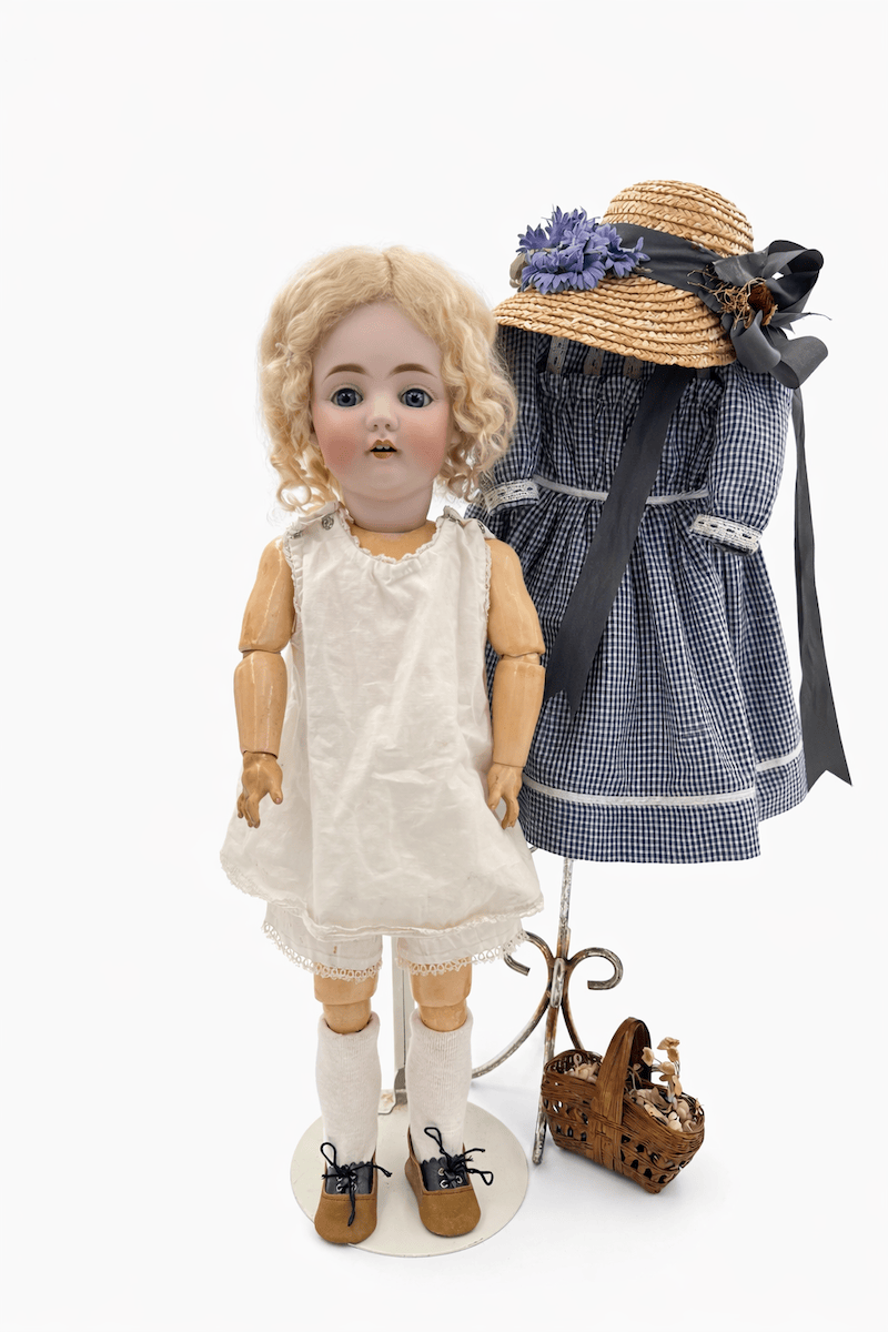 A Girl with a Basket —Kestner, Mold 143, Germany, c.1900–1915